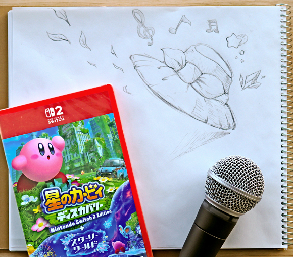 ゲームパッケージと熊崎が描いたスケッチ